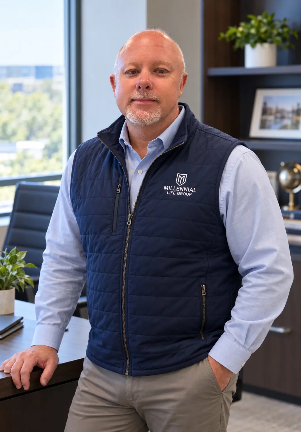 James Michael Kaufer, independent Medicare agent with Millennial Life Group LLC, standing in a conference room