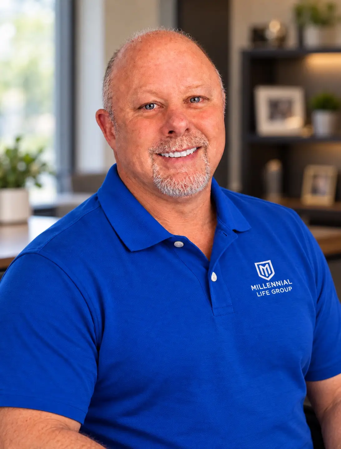 James Kaufer wearing a blue Millennial Life Group polo